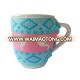 ceramic cup with sweater sleeve